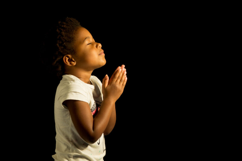 A,Young,Child,Prays,To,God.